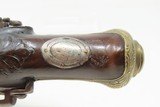 SPANISH PATILLA MIQUELET Pistol w Belt Hook & Bust Décor .69 cal
Engraved Early-19th Century Carved Miquelet Conversion Pistol - 7 of 16