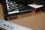 Nosler Trophy Grade 257 Roberts 110 Accubond Factory Ammo - 2 of 3