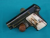 Custom Colt 1908 vest pocket .25 auto with gold inlay and mastodon grips - 5 of 7
