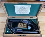 Cased Pair of Consecutively Serialized Colt New Police Model “Cop & Thug” Revolvers with Very Scarce London Barrel Address