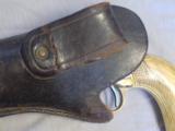 FINE COLT MODEL 1860 PERCUSSION REVOLVER WITH CHECKERED IVORY GRIPS AND TOOLED "SLIM JIM" HOLSTER
- 10 of 10