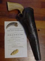 FINE COLT MODEL 1860 PERCUSSION REVOLVER WITH CHECKERED IVORY GRIPS AND TOOLED "SLIM JIM" HOLSTER
- 3 of 10