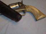 FINE COLT MODEL 1860 PERCUSSION REVOLVER WITH CHECKERED IVORY GRIPS AND TOOLED "SLIM JIM" HOLSTER
- 7 of 10