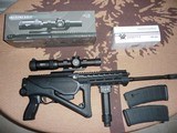 sig sauer- 556xi semi auto black finish , colapsible/ folding swiss stile stock. 22.3 and 55.6 nato - 7 of 7