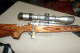 Model 7 Remington Stainless 7mm-08 w/ Matching Zeiss 3x9x40 - 1 of 9