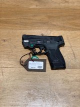 Smith and Wesson Shield 1.0 with Crimson Trace Green Laser - 1 of 2