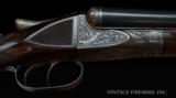 A.H. Fox 16 Gauge –FACTORY ORDER “SPECIAL EJECTOR" GRADE, ENGLISH GRIP, HIGH FIGURE WOOD!
- 1 of 25