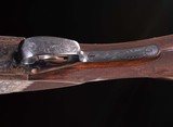 Ithaca SINGLE BARREL TRAP – 1915, 34”, GRADE 6 ENGRAVED, vintage firearms inc - 19 of 25