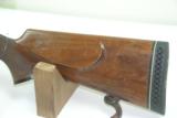 Savage 250-3000 bolt action with Redfield scope
- 6 of 12