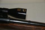 Savage 250-3000 bolt action with Redfield scope
- 12 of 12