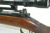 Savage 250-3000 bolt action with Redfield scope
- 5 of 12