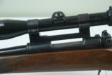 Savage 250-3000 bolt action with Redfield scope
- 4 of 12