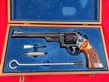 Smith & Wesson
model 27-2
in 357mag WITH 8 3/8" BARREL IN IT'S WOODEN PRESENTATION BOX - 1 of 15