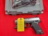 Heckler & Koch USP
.40 S&W
stainless like new with extras - 12 of 14