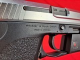Heckler & Koch USP
.40 S&W
stainless like new with extras - 7 of 14