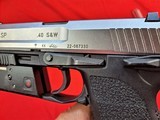 Heckler & Koch USP
.40 S&W
stainless like new with extras - 9 of 14