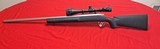 Remington 700
308 with stainless barrel and scope - 2 of 15
