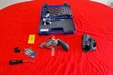 Smith & Wesson 686 Plus 7 shot revolver and extras