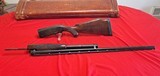 Winchester model 12 shotgun with leather case (open to offers)