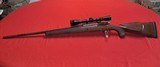 Custom Built 338 caliber bolt action rifle with scope - 1 of 13