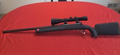 Savage model 10308 with bull barrel and scope