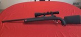 Savage model 10308 with bull barrel and scope