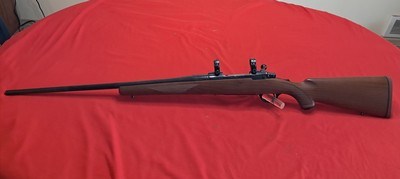Ruger M77 7mm mag rifle with scope rings - Image 1 of 13