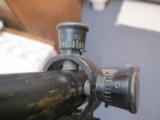 Vintage Mossberg Scope with Mossberg #7 target
scope mount. - 5 of 12