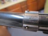 Vintage Mossberg Scope with Mossberg #7 target
scope mount. - 7 of 12