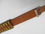 BRAUER BROS MFG. CO. 12 GA. BELT WITH 18
12 GA. BRASS SHELLS - 15 of 15