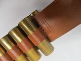 BRAUER BROS MFG. CO. 12 GA. BELT WITH 18
12 GA. BRASS SHELLS - 14 of 15