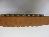 BRAUER BROS MFG. CO. 12 GA. BELT WITH 18
12 GA. BRASS SHELLS - 12 of 15