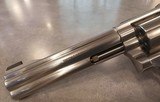 Smith & Wesson 617-1 with original grips, box, and papers - 5 of 14