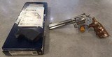 Smith & Wesson 617-1 with original grips, box, and papers - 1 of 14