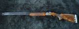 Beretta DT-10 Trident 12 Gauge 32 exhibition Grade Wood; as new from Beretta. Eight Chokes - 10 of 13