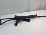 Bushmaster Assault Rifle 5.56 - 1 of 6