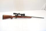 Winchester Model 70 7mm WSM w Vortex Diamondback 4-12x40 - 1 of 7