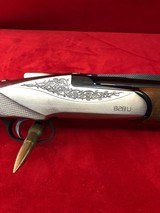 Benelli 828 U 20 Gauge with Beautiful Fish Scale engraving throughout the gun. - 2 of 7