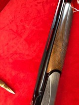 Benelli 828 U 20 Gauge with Beautiful Fish Scale engraving throughout the gun. - 7 of 7