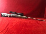 Remington 700 Stainless 300 RUM w/ Zeiss