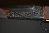 Winchester Model 21 Factory letter pigeon grade #6 engraving. 20ga,
28” barrels
- 1 of 6