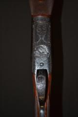 Winchester Model 21 Factory letter pigeon grade #6 engraving. 20ga,
28” barrels
- 3 of 6