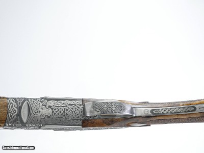 CSMC - A10, O/U Sidelock, Platinum Celtic Pattern, 12ga. 28” Barrels with Screw-in Choke Tubes. MAKE OFFER. - Image 9 of 11