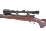 Winchester - Model 70 Custom w/Leupold 12x Mounted Scope, .22-250-3000 Savage. 24