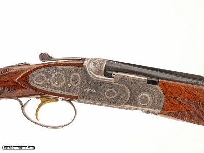 CSMC - A10, O/U Sidelock, Rose & Scroll, 28ga. 32” Barrels with Screw-in Choke Tubes. MAKE OFFER.