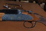 CSMC - RSP, Sideplated, O/U, Deep Vine Scroll Full Coverage Engraving, 20ga. 28