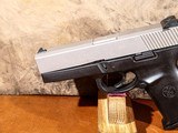 Smith & Wesson - Model SW40V, .40 S&W. 4