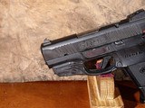 Ruger - SR9C w/Laser, 9mm. 3.5