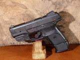 Ruger - SR9C w/Laser, 9mm. 3.5