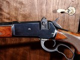 Winchester - Model 71 Deluxe, .348 Winchester. 24